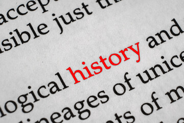 Selective focus on the red word history. Macro shot printed red colour word History on a piece of paper.