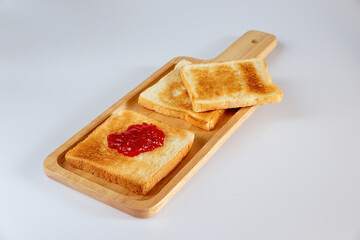 Toast isolated on white background. toast on wooden board.