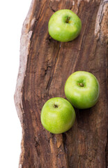 fresh season green apples on vintage wooden background