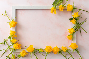 Yellow roses with wooden frame