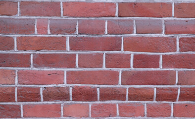 artificial stone of regular shape, used as a building material. creative brick background. copy space