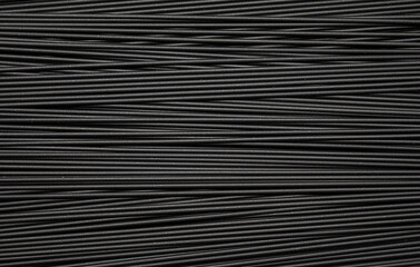 Black spaghetti background. Spaghetti squid ink "romagnola" style.