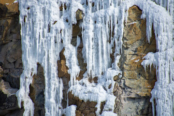 Ice on the cliff of a quarry