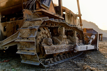 yellow excavator with a steering wheel digging out the ground summer sand truck