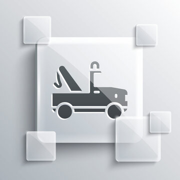 Grey Tow truck icon isolated on grey background. Square glass panels. Vector.