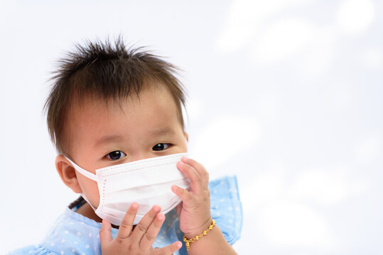 Little Asian Baby Girl Wit Face Mask