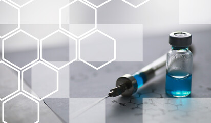 small jars with injection and syringe for injection on a blue background near the chemical formula