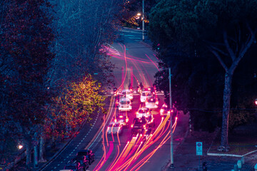 Cool long exposure cars traffic light trails view from above the city of Rome