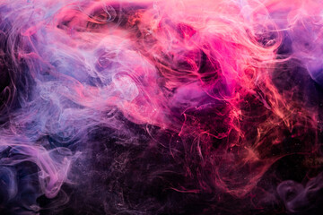 Color smoke background. Fume texture. Ink in water explosion. Passion spell. Glowing vibrant magenta pink violet vapor mix on dark.