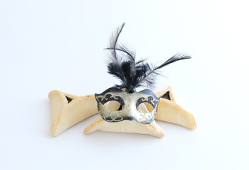 Purim celebration concept (jewish carnival holiday) over white isolated background