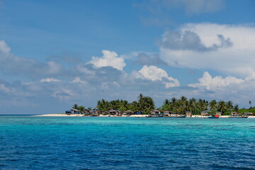 Malaysia. Coconut palms at numerous reef Islands near the island of Borneo near the town of Semporna