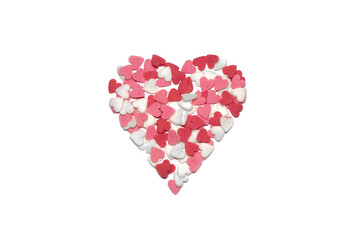 Sweet hearts. Pink, red and white heart shaped sugar sprinkles. Colorful heart made of lots of little hearts. Valentine's day or Mothers day background or card.