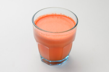 Isolated citrus juice. One glass with orange, grapefruit or lemon juice isolated on white background.