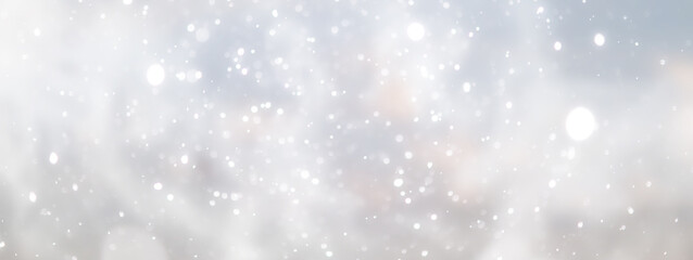 Fototapeta premium blue snowfall bokeh background, abstract snowflake background on blurred abstract blue