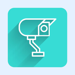 White line Security camera icon isolated with long shadow. Green square button. Vector.