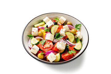 Classic Greek salad with fresh vegetables, feta cheese and  olives. Healthy food. isolated on white...