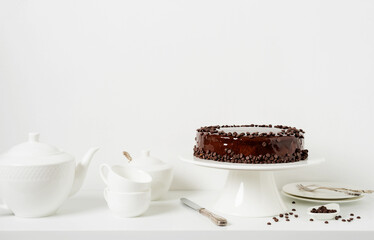 Freshly made delicious chocolate cake on white background.