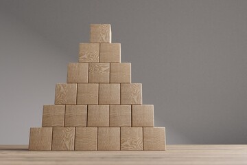 Arranged wood cube stacking as shape, mock up for create symbol, business growth and management concept.