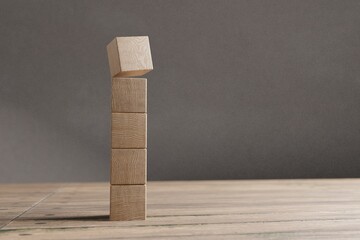 Arranged wood cube stacking as shape, mock up for create symbol, business growth and management concept.