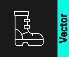White line Waterproof rubber boot icon isolated on black background. Gumboots for rainy weather, fishing, gardening. Vector.