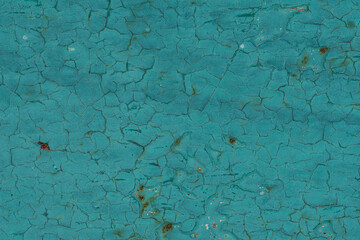 Texture of old turquoise paint on metal