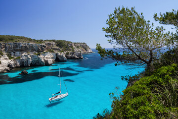 Beautiful bay with sailing boats, Menorca island, Spain. - obrazy, fototapety, plakaty