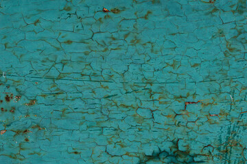 Texture of old turquoise paint on metal