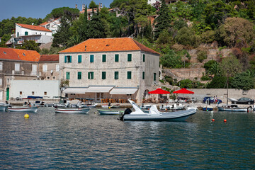 Fototapeta na wymiar Old harbor at Adriatic sea. Hvar island, Croatia, popular touristic destination