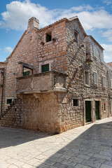 Hvar island, Croatia, popular touristic destination. Colorful traditional European houses on a sunny day