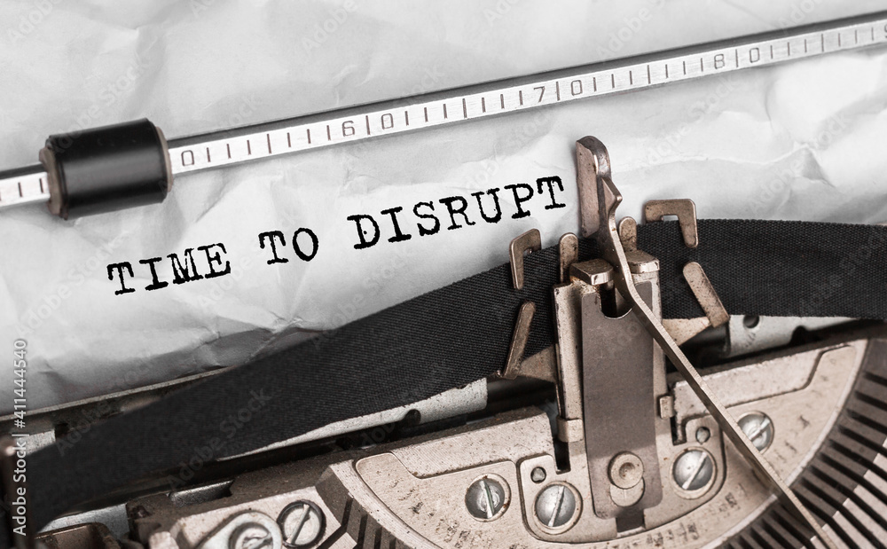 Fototapete text time to disrupt typed on retro typewriter