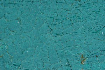 Texture of old turquoise paint on metal