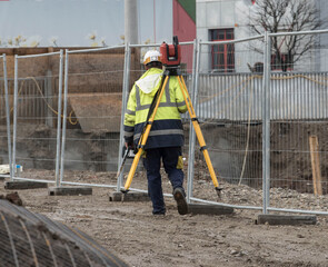 surveying by a land surveyor in geodesy