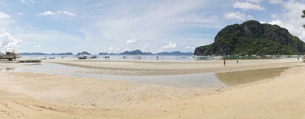 Tropical mountain and beach landscapes at El Nido town on Palawan Island in the Philippines.