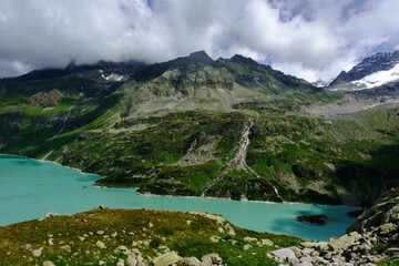 Fototapeta na wymiar wonderful turquoise lake in the mountains view from above