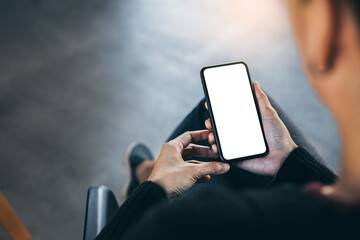 cell phone blank white screen mockup.woman hand holding texting using mobile on desk at office.background empty space for advertise.work people contact marketing business,technology