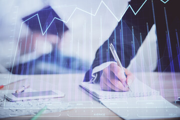 Double exposure of forex chart drawing over people taking notes background. Concept of financial analysis