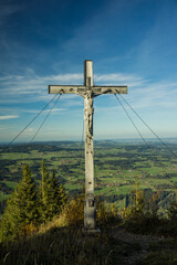 Fototapeta premium cross the on mountain peak