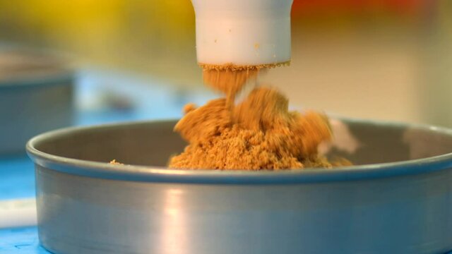 The production of delicious and colorful cakes is made in the factory. Making many kinds of cakes from chocolate to fruit, from hazelnut to pistachio, from cheese to coffee.