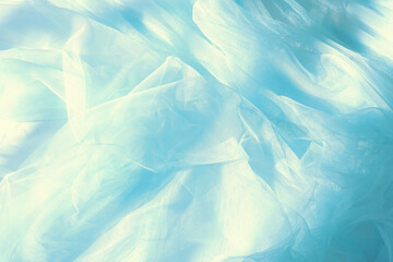 Obraz premium Vintage pastel blue tulle chiffon texture background with shadows