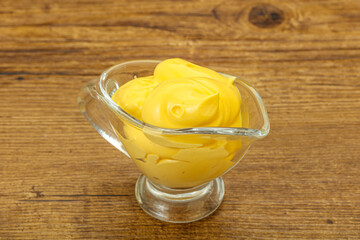 Natural cheese sauce in the bowl