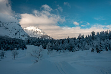 Fototapeta na wymiar Ski mountaineering on mount Mangart, near the Slovenian border, Friuli-Venezia Giulia, Italy