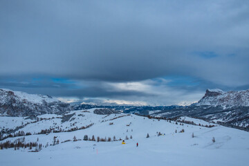 Stormy clouds in italian dolomites in a snowy winter