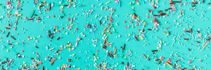 Festive sprinkles of sugar sweets. Party, birthday, holiday background