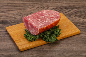 Beef ham piece over board