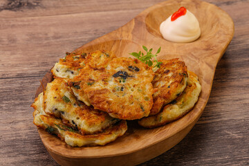 Zucchini pancakes with herbs and spices