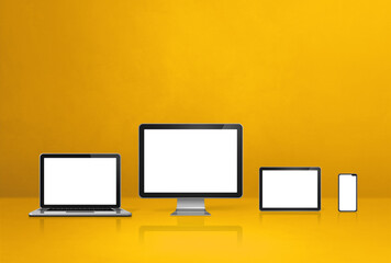 computer, laptop, mobile phone and digital tablet pc. yellow background