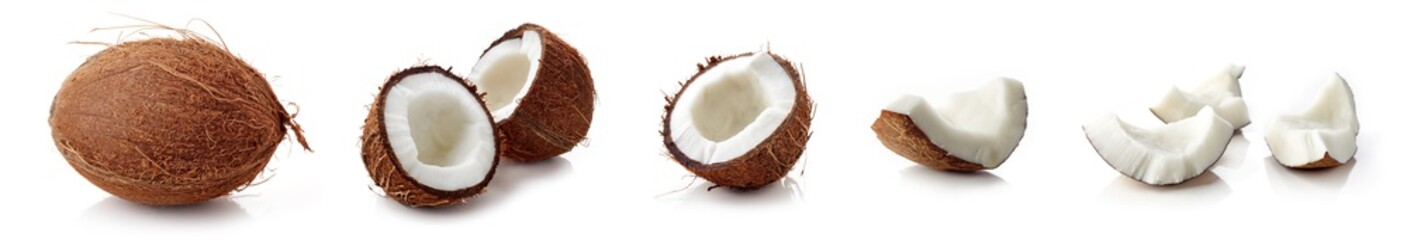 Coconut halves and pieces isolated on white