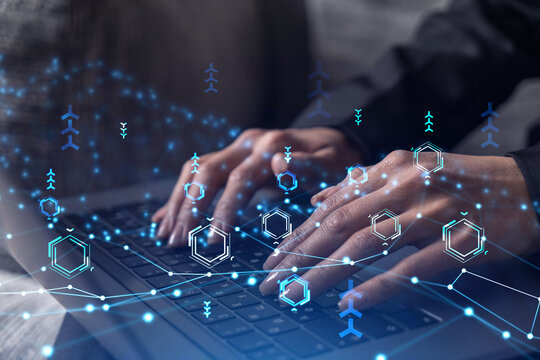 Woman typing the keyboard to create innovative software to change the world and provide a completely new service. Close up shot. Hologram tech graphs. Concept of Dev team. Formal wear.