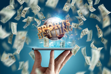 Online sports betting. Dollars are falling on the background of a hand with a smartphone and a soccer ball. Creative background, gambling.