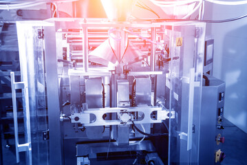 Vertical multi-head weigher packaging machine snacks and chips in a factory